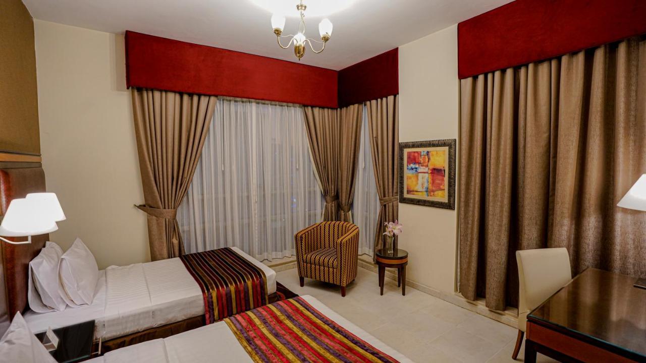 Xclusive Hotel Apartments Дубай Екстериор снимка